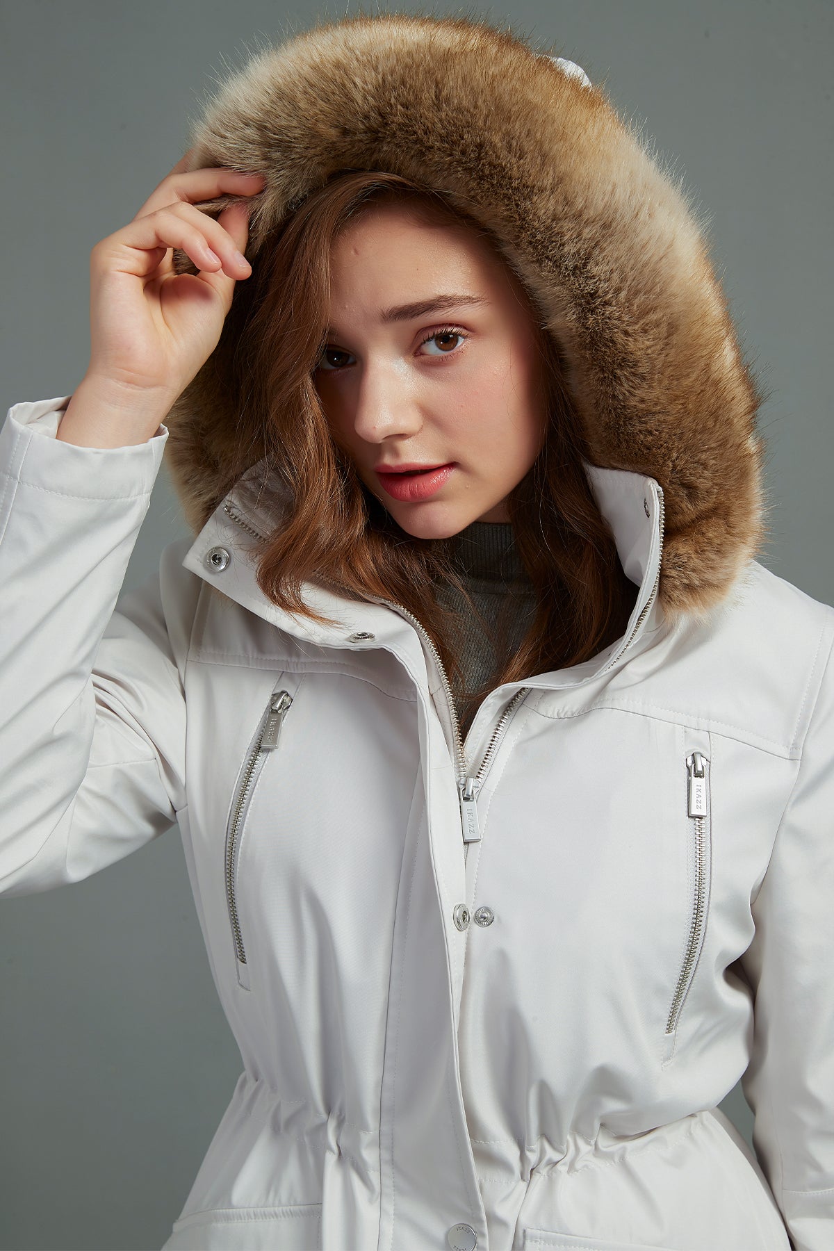 White faux outlet fur hooded coat